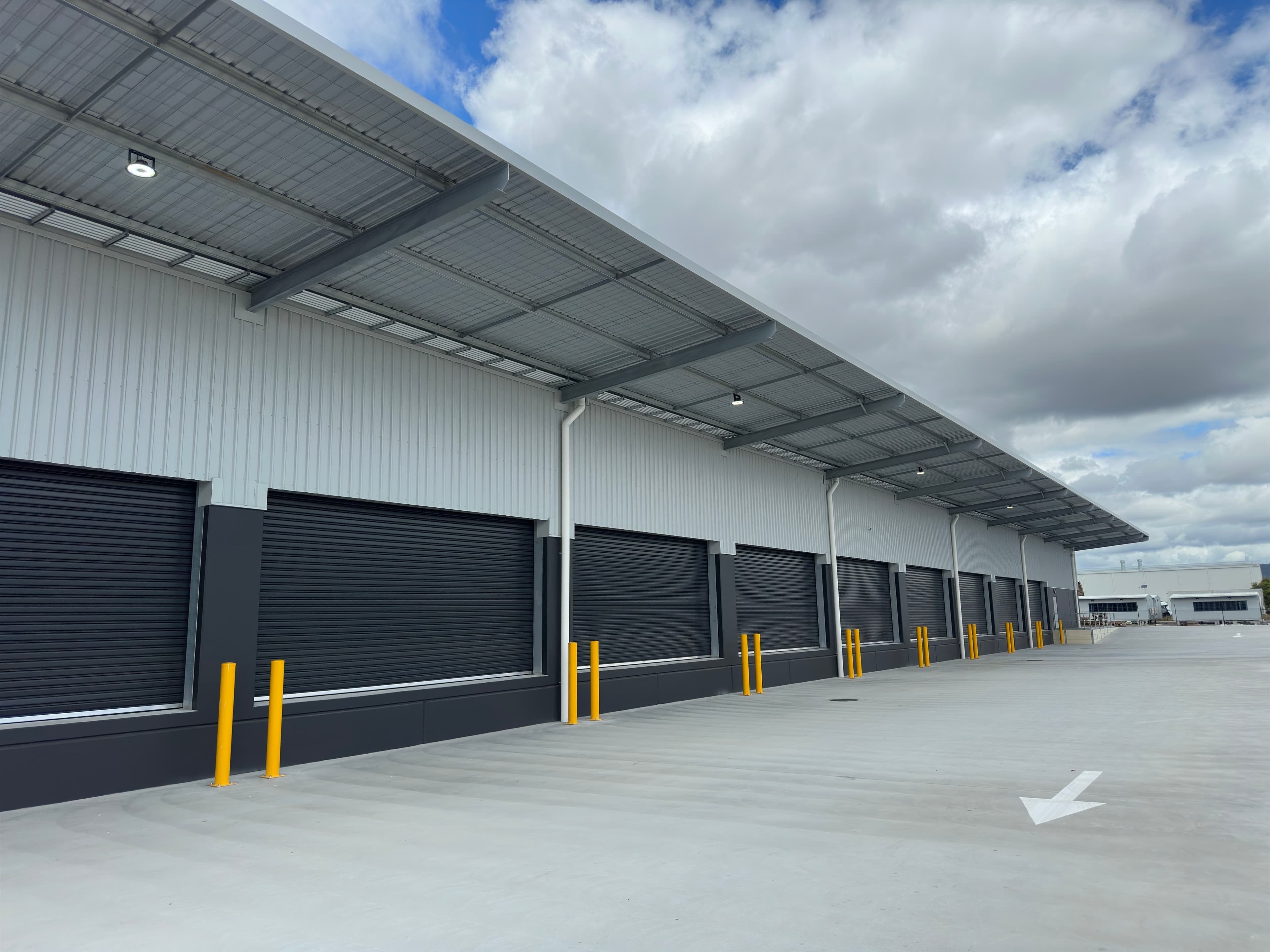 Steel slatted shutter installation